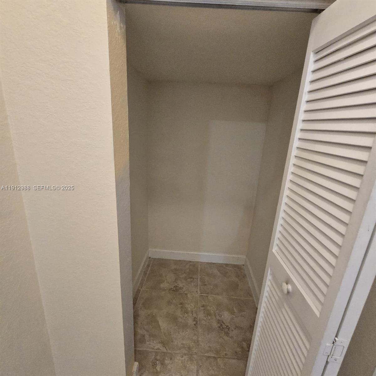 9051 Southwest 227th Street, Unit 3 Cutler Bay, FL 33190 - Photo 18 of 33 a view of a room