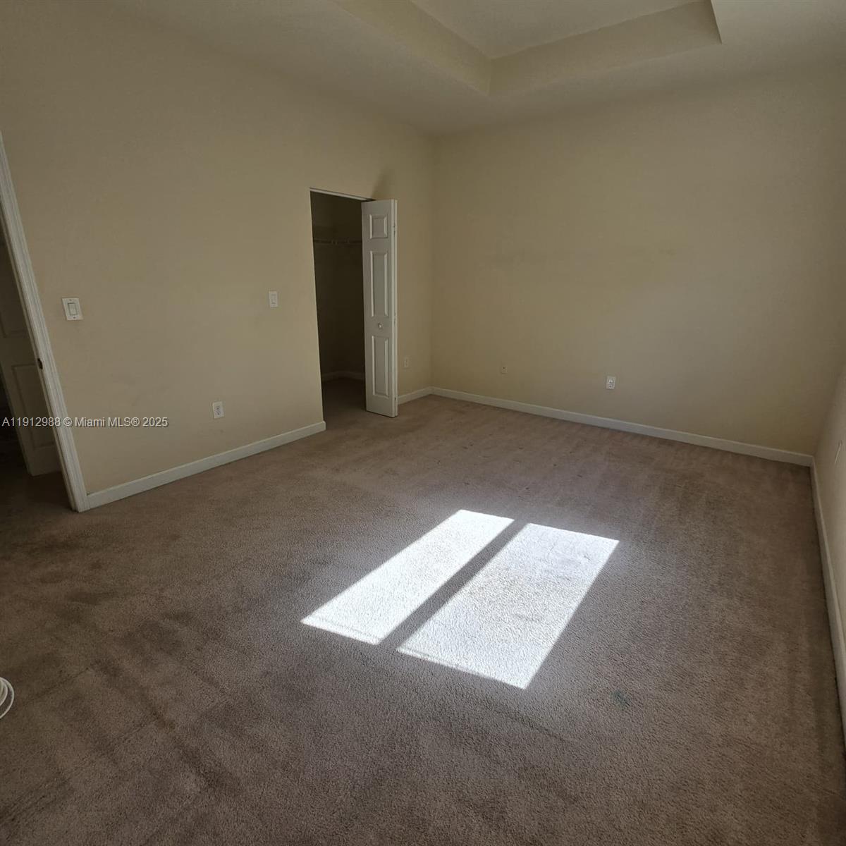 9051 Southwest 227th Street, Unit 3 Cutler Bay, FL 33190 - Photo 23 of 33 an empty room with an empty space