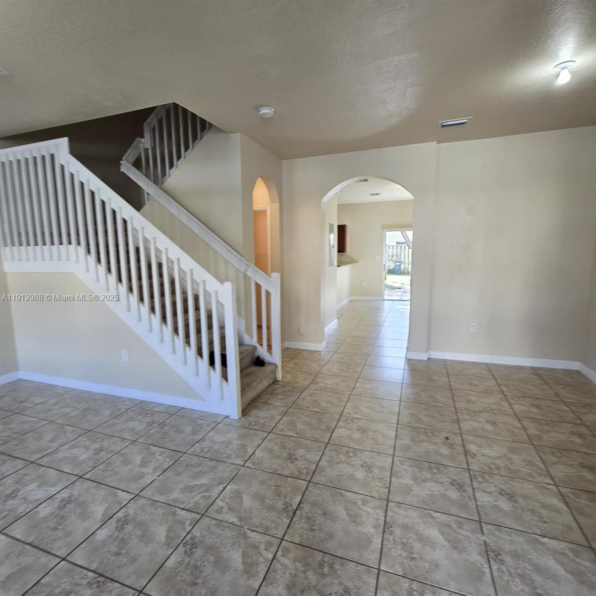 9051 Southwest 227th Street, Unit 3 Cutler Bay, FL 33190 - Photo 4 of 33 a view of a hallway with entryway