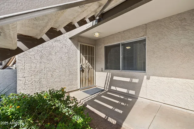 a view of balcony with wooden floor and chair