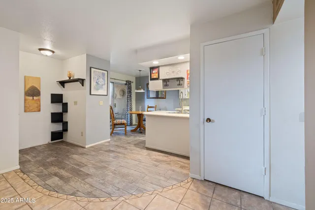 a view of a kitchen with a refrigerator