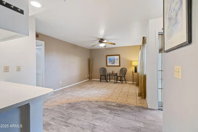 a view of livingroom with furniture and a window