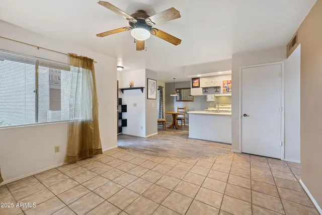a view of a kitchen with furniture and a kitchen