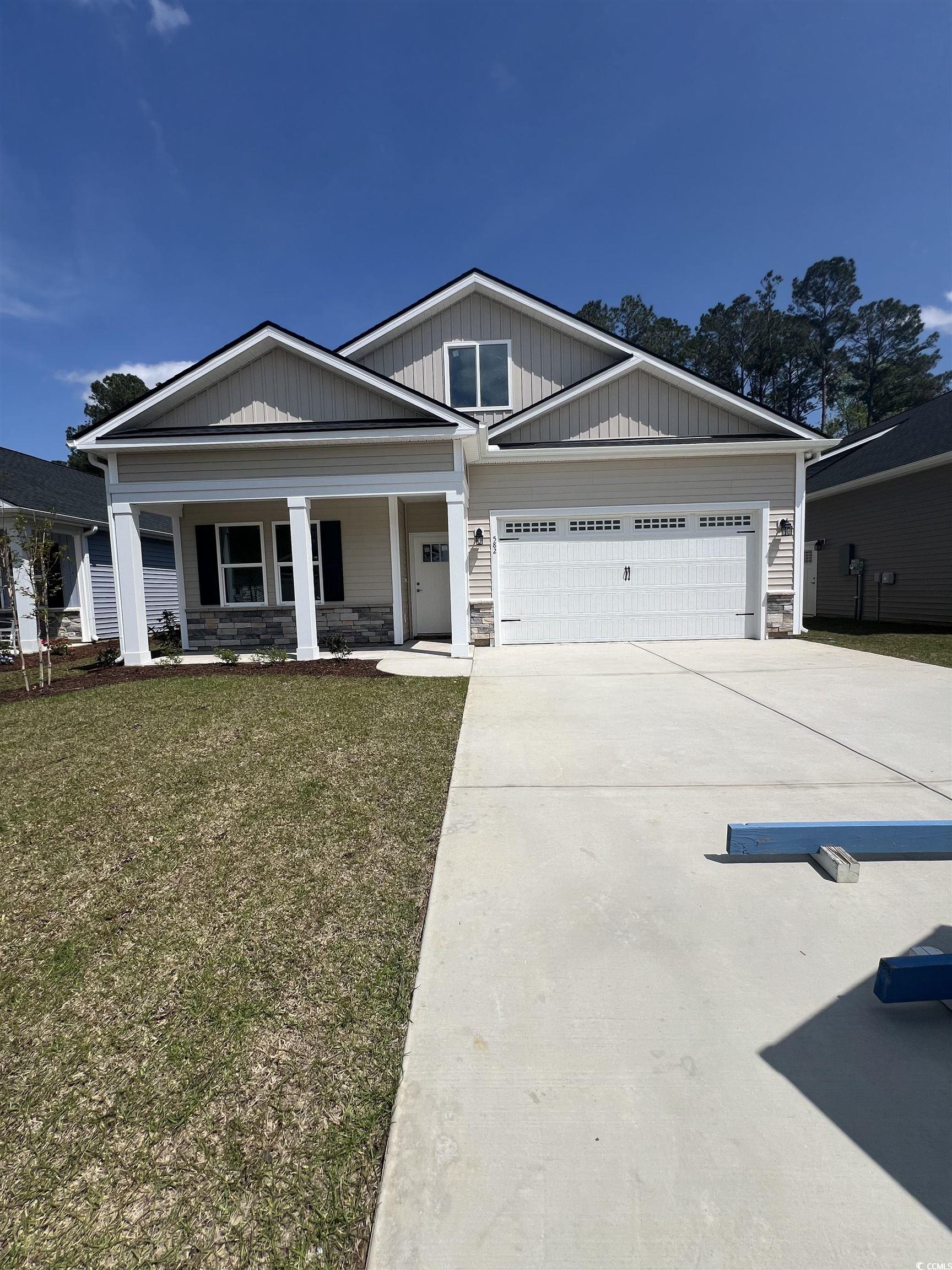 582 Beckham Court Murrells Inlet, SC 29576 - Photo 1 of 19 View of front of property featuring stone siding,