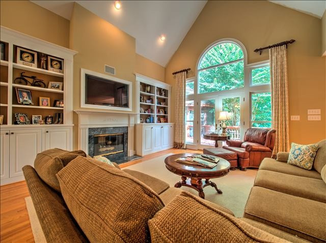 4620 Hidden Harbor Lane Raleigh, NC 27615 - Photo 10 of 25 Built-ins and floor to ceiling windows...tons of natural light! Family Room