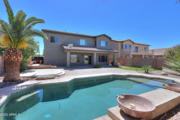 a view of a house with a swimming pool