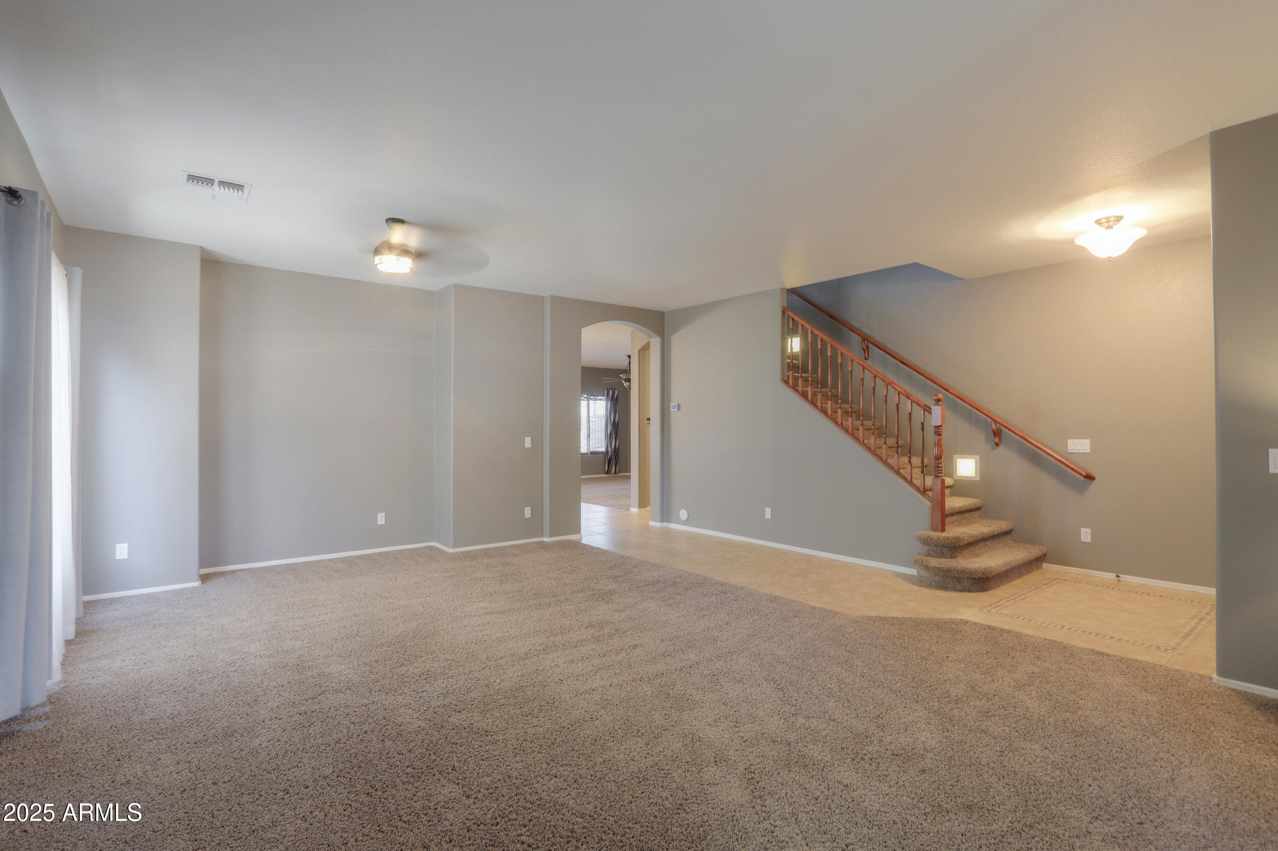 44254 Adobe Circle Maricopa, AZ 85139 - Photo 15 of 71 a view of an empty room with stairs