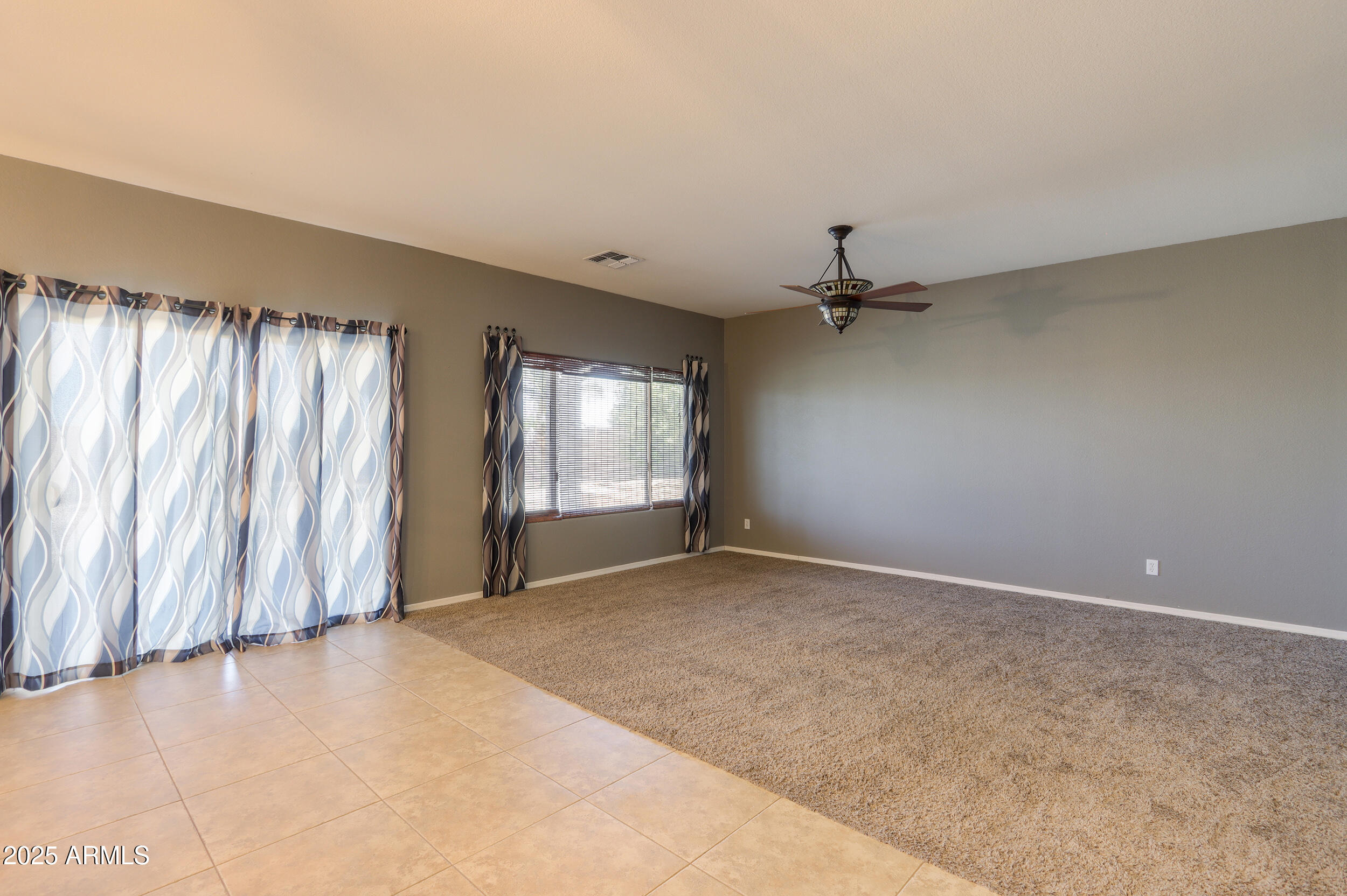 44254 Adobe Circle Maricopa, AZ 85139 - Photo 23 of 71 wooden floor in an empty room with a window