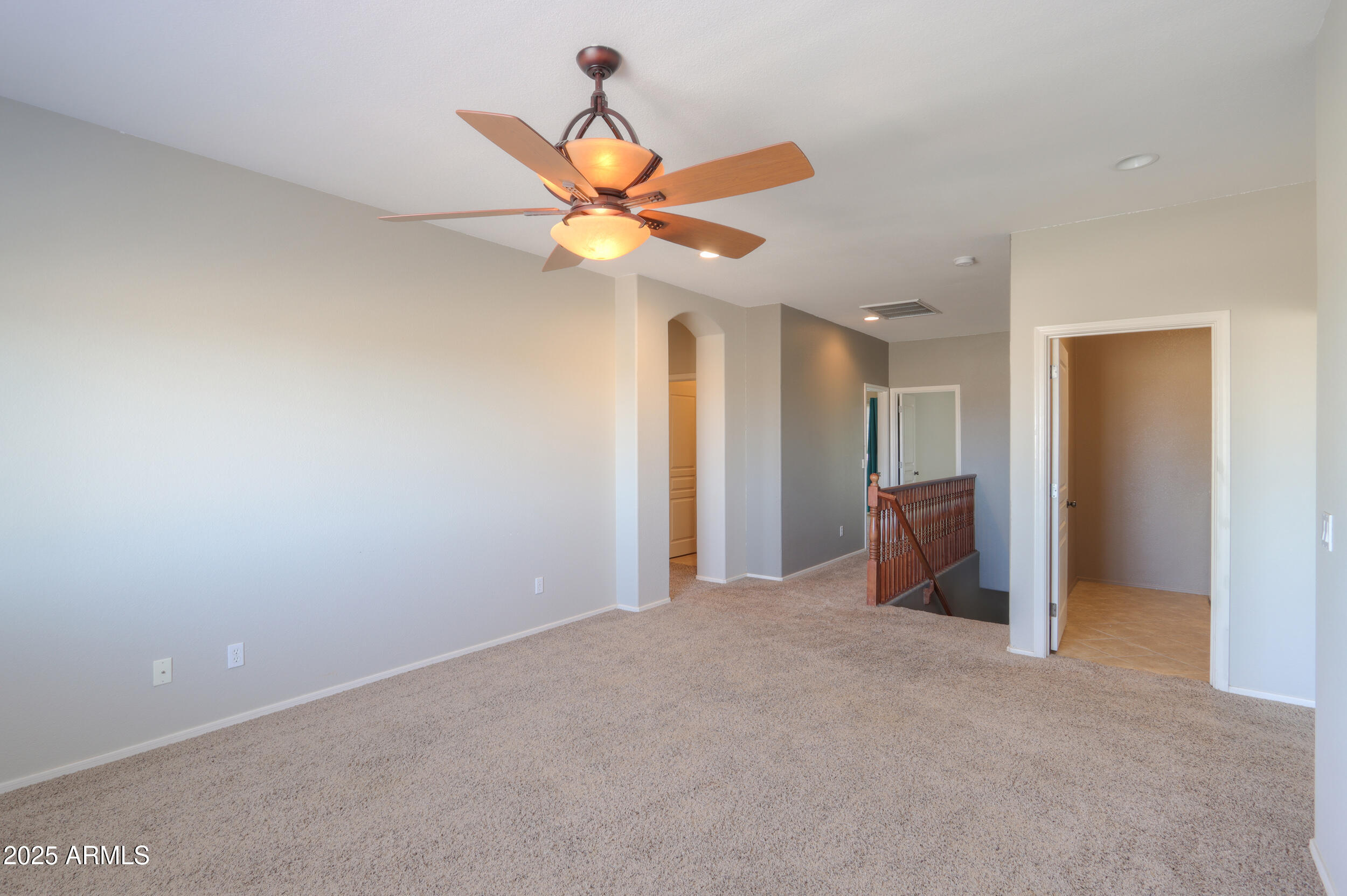 44254 Adobe Circle Maricopa, AZ 85139 - Photo 30 of 71 a view of a livingroom with a ceiling fan and a chandelier fan