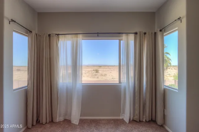 a view of a swimming pool with an outdoor space and seating area