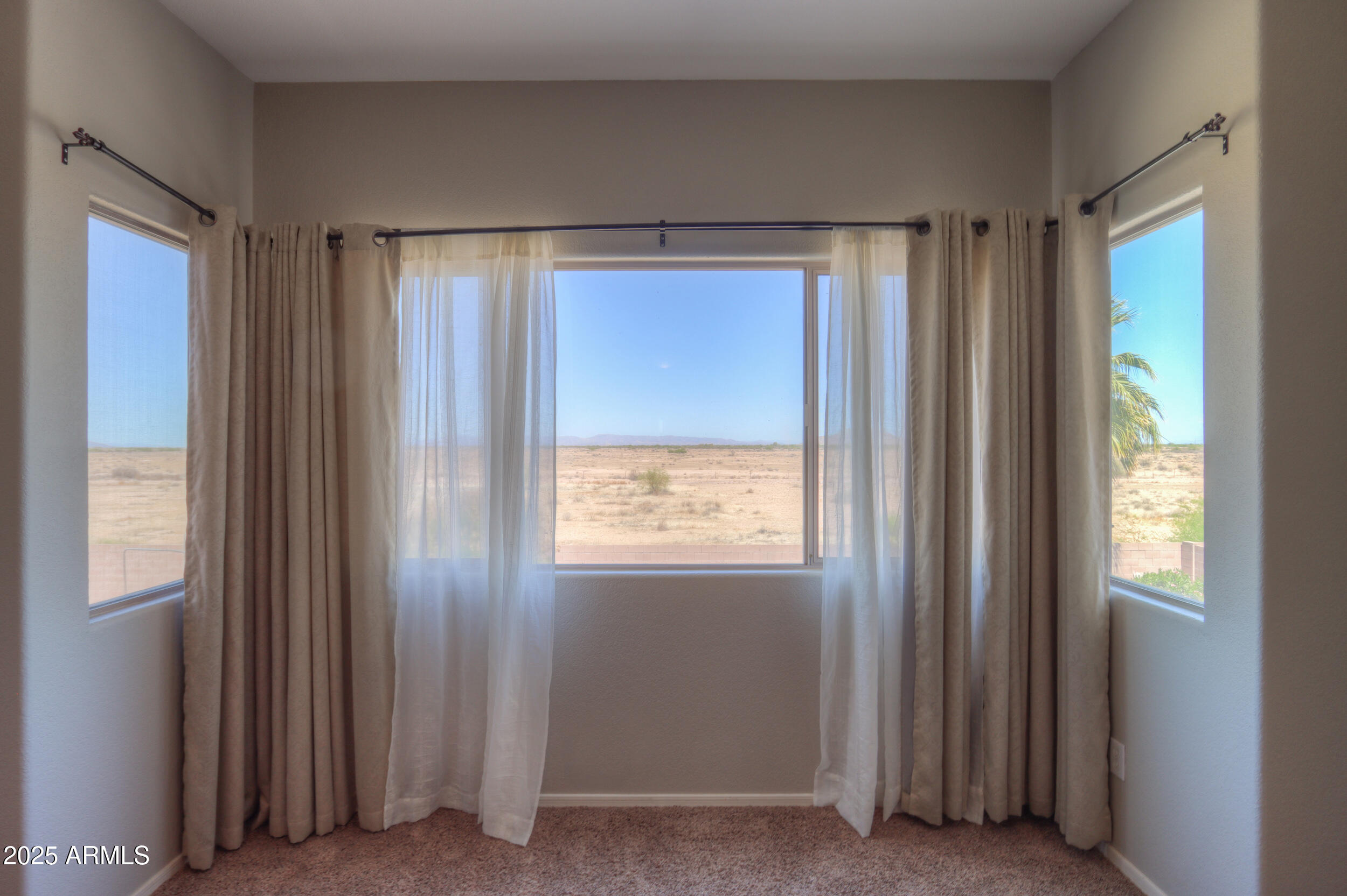 44254 Adobe Circle Maricopa, AZ 85139 - Photo 41 of 71 a view of an empty room with a window