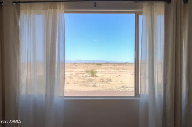 a view of a swimming pool with an ocean view
