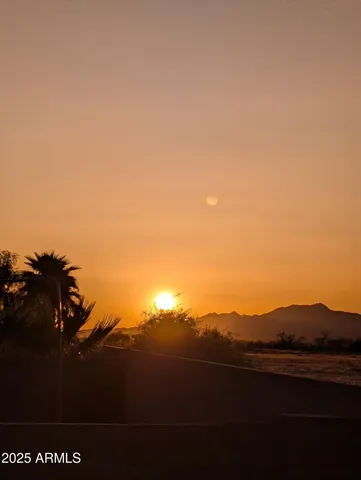 a view of a park with swings and slides