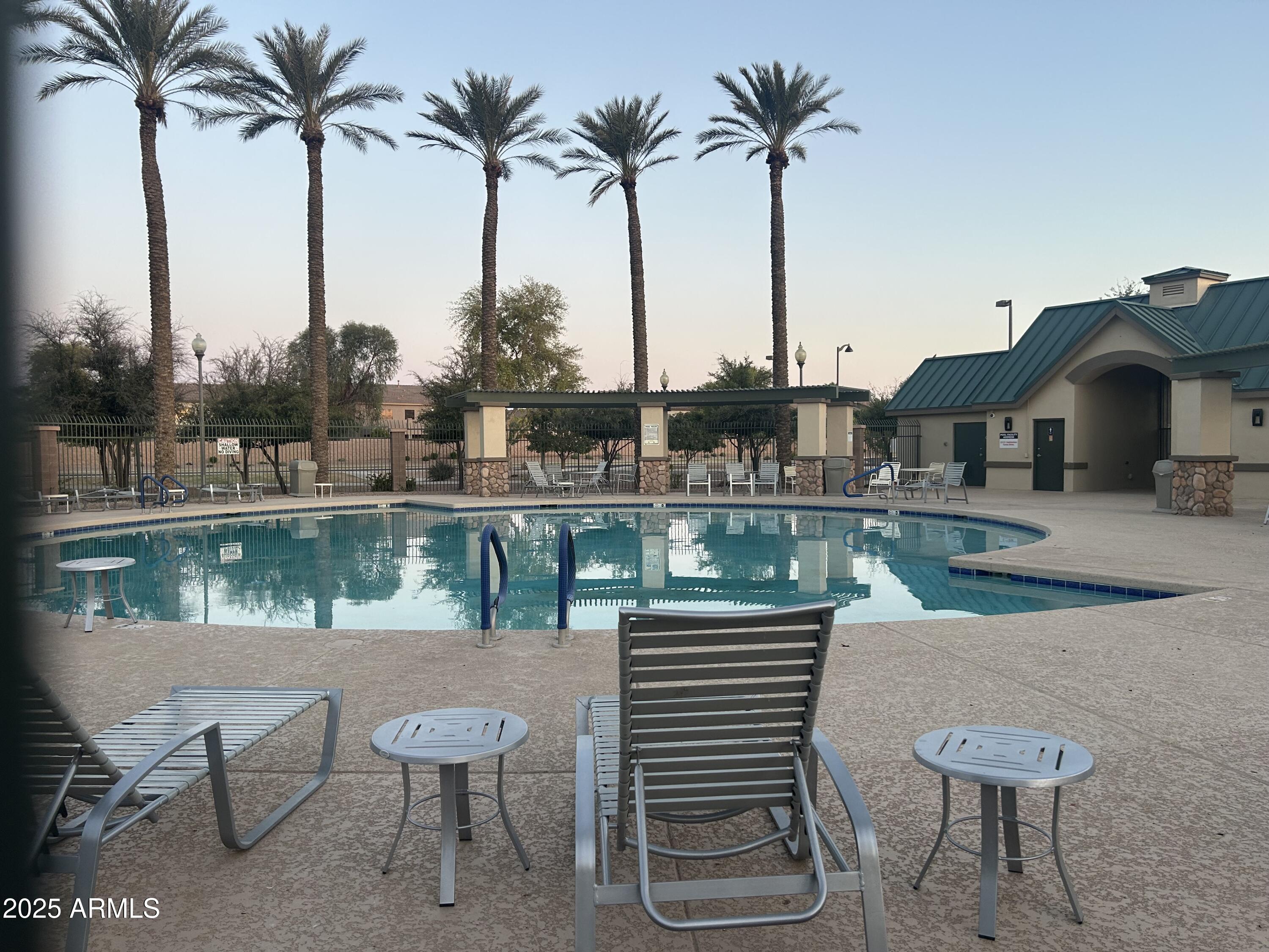 44254 Adobe Circle Maricopa, AZ 85139 - Photo 58 of 71 a view of outdoor space with seating area and lake view