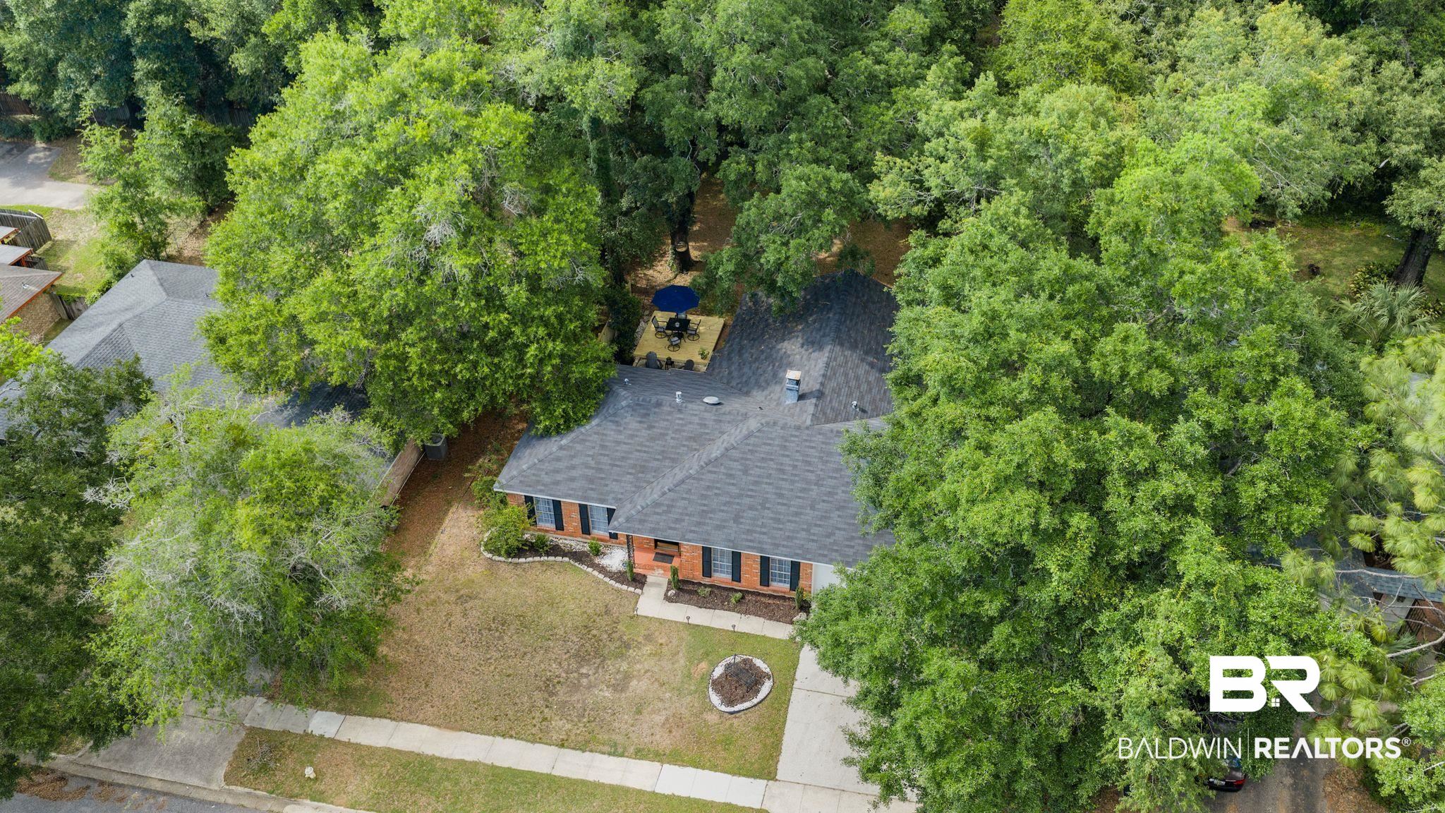 4724 Wicker Way Mobile, AL 36609 - Photo 32 of 36 Single-story residence featuring a dark gray shingle roof and brick exterior
