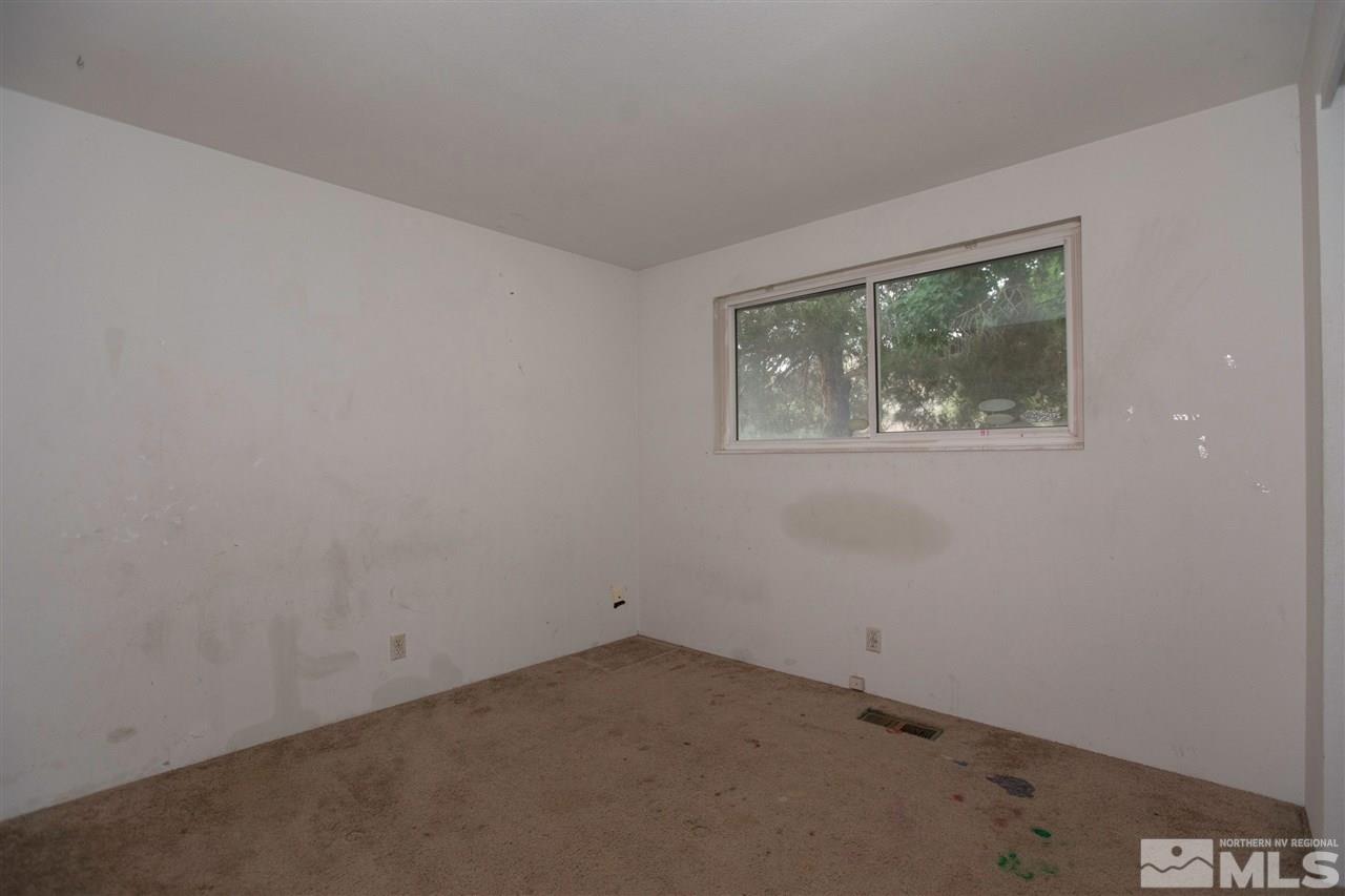 9055 Reservoir Street Reno, NV 89506 - Photo 14 of 15 an empty room with a window