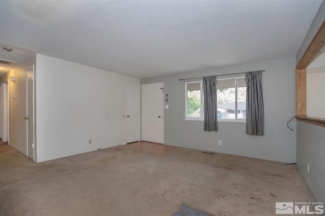 9055 Reservoir Street Reno, NV 89506 - Photo 7 of 15 an empty room with windows
