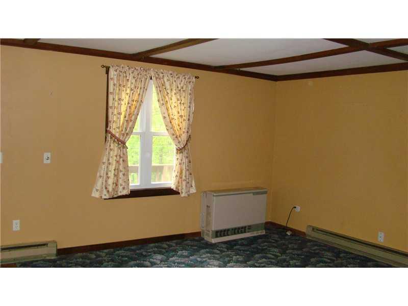5 Forest Hill Road Temple, ME 04984 - Photo 3 of 16 Living Room. Living room with Rinnai...