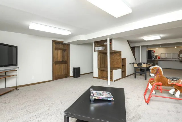 a room with furniture and a flat screen tv