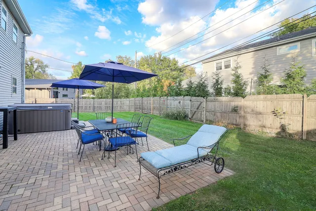 a view of a patio with chair and table