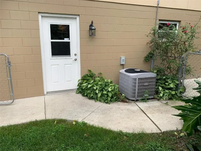 a view of potted plant in front of house