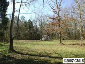 16832 Plaincrest Road Midland, NC 28107 - Photo 2 of 8 a view of outdoor space with trees all around