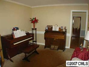 16832 Plaincrest Road Midland, NC 28107 - Photo 4 of 8 a living room with furniture