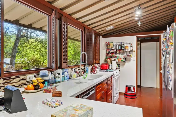 a room with furniture and a large window
