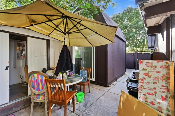 a view of swimming pool with outdoor seating