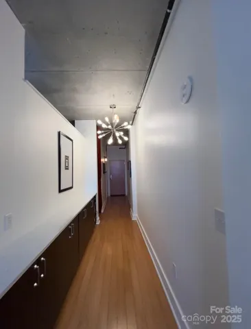 a view of a hallway with workspace