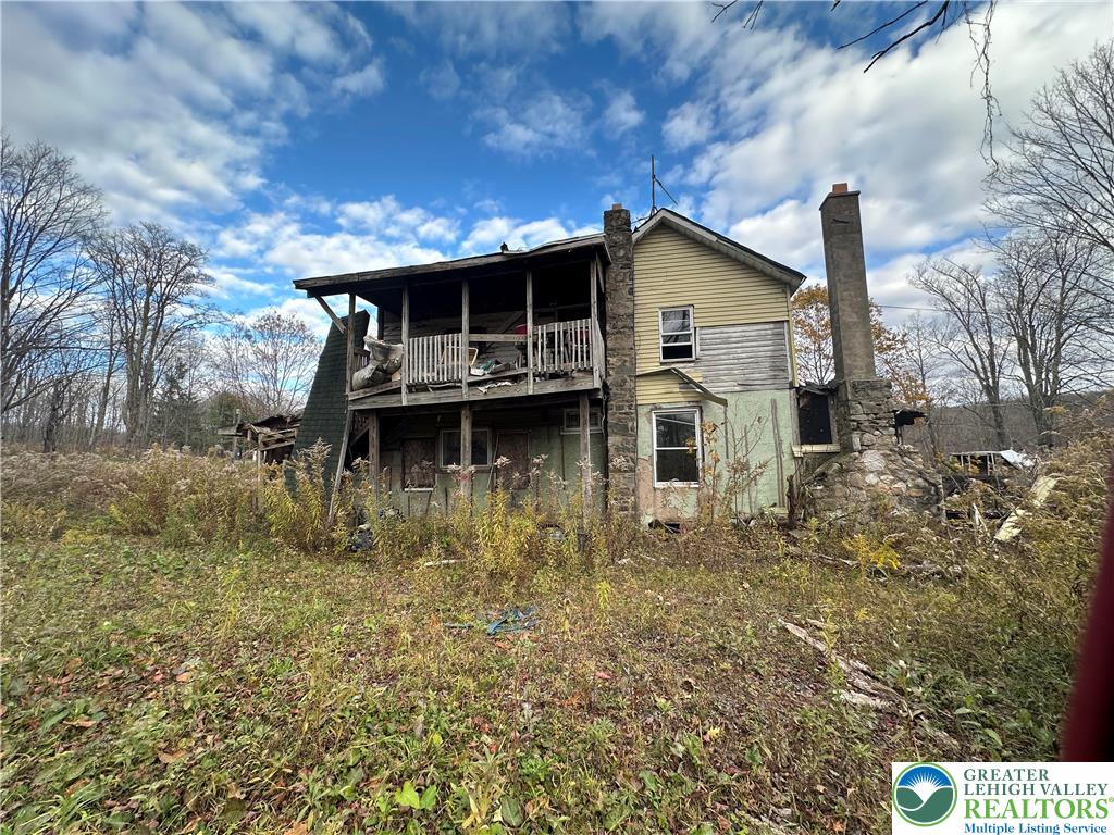27 Richland Road Moscow, PA 18444 - Photo 7 of 10 a house view with a wooden fence