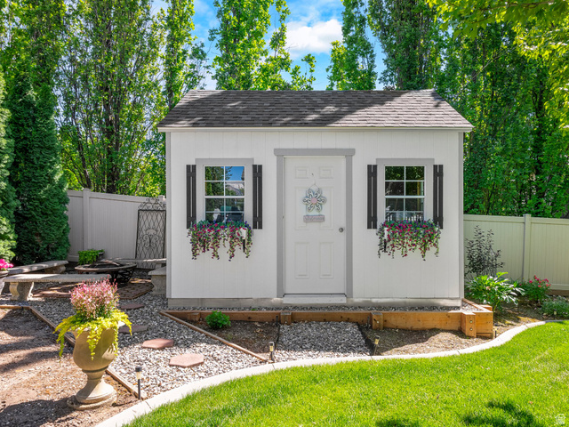 955 West 2390th South Perry, UT 84302 - Photo 36 of 51 Shed inlcuded and allows the buyer to have outdoor storage with style