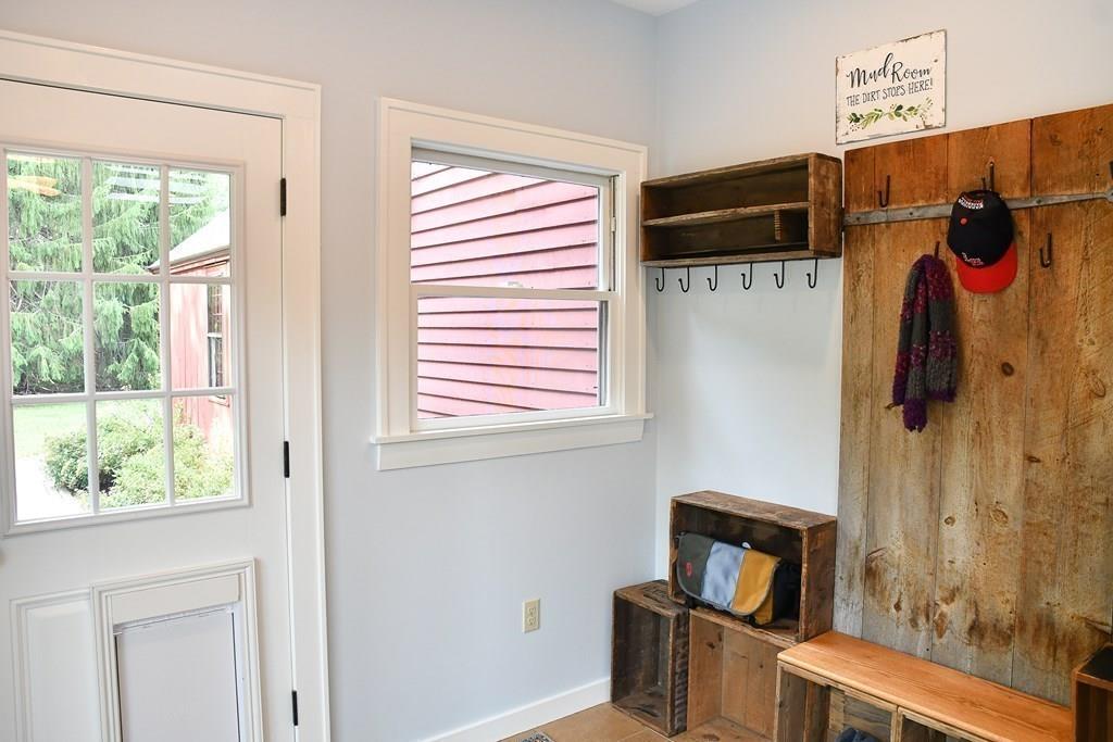 210 Haynes Road Sudbury, MA 01776 - Photo 26 of 42 a view of a room with a window and a bed