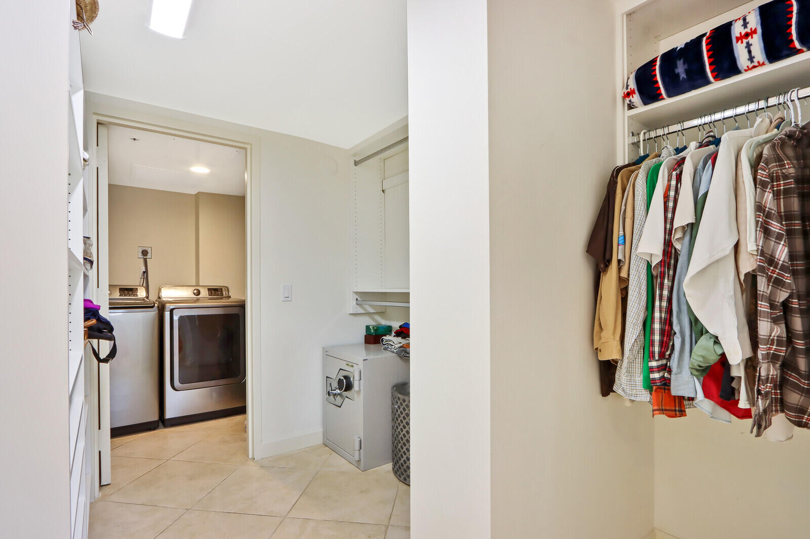 50 South Beach Road, Unit 102 Tequesta, FL 33469 - Photo 15 of 28 Master Closet & Laundry