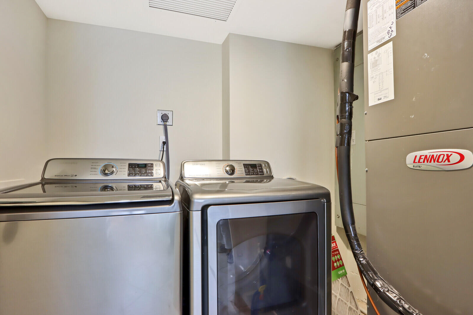 50 South Beach Road, Unit 102 Tequesta, FL 33469 - Photo 16 of 28 Laundry Room