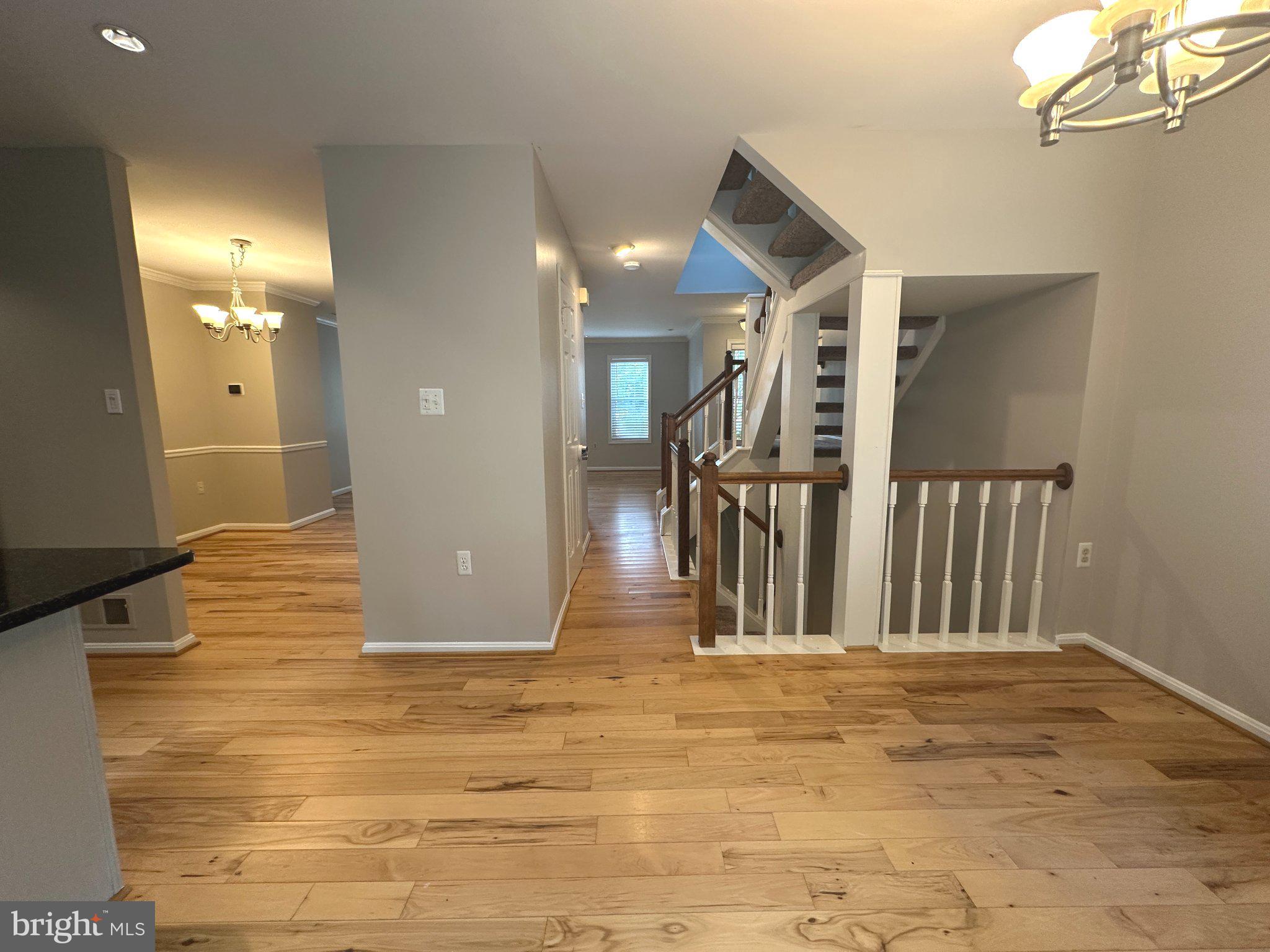 11928 Sentinel Point Court Reston, VA 20191 - Photo 6 of 23 Spacious entryway with warm wood floors.