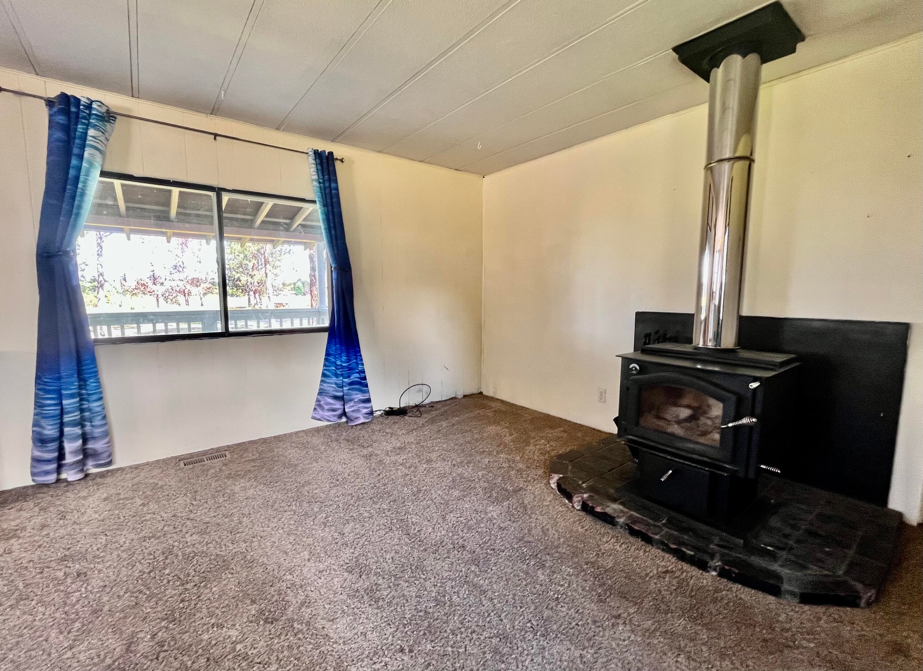 52731 Huntington Road, Unit 26 La Pine, OR 97739 - Photo 12 of 20 Wood Stove
