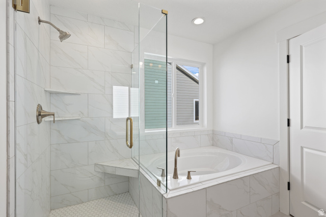 1139 South 4475 West West Point, UT 84015 - Photo 19 of 33 Full bath featuring a bath, a marble finish shower, and recessed lighting