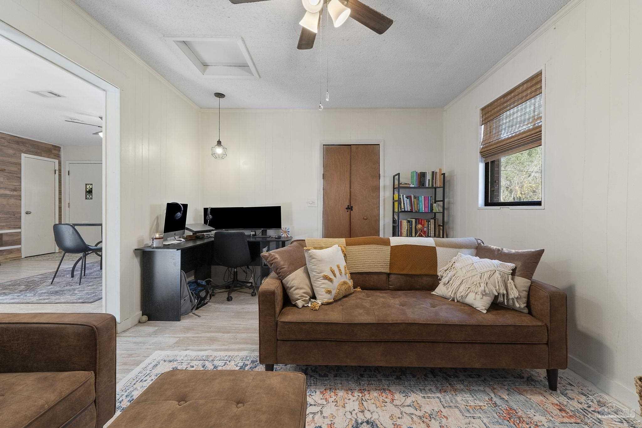 465 Ronda Street Pensacola, FL 32534 - Photo 15 of 48 a living room with furniture and a fireplace