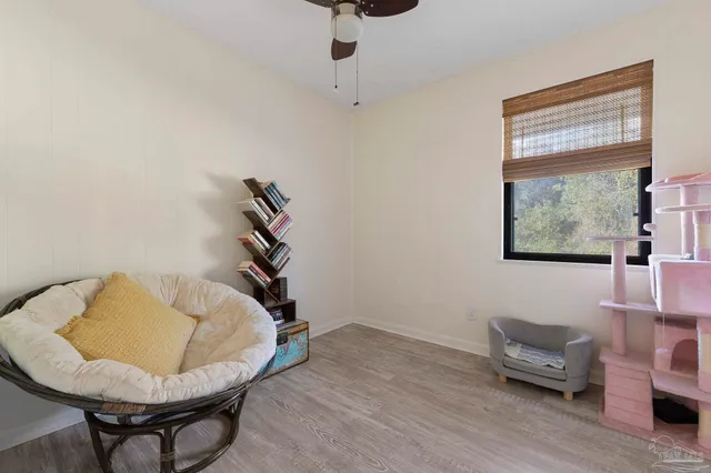 a room with furniture and a window