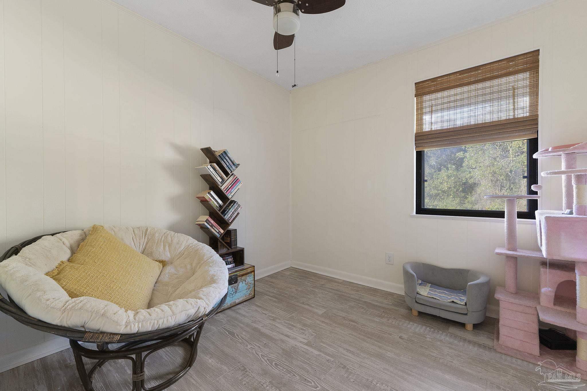 465 Ronda Street Pensacola, FL 32534 - Photo 17 of 48 a room with furniture and a window