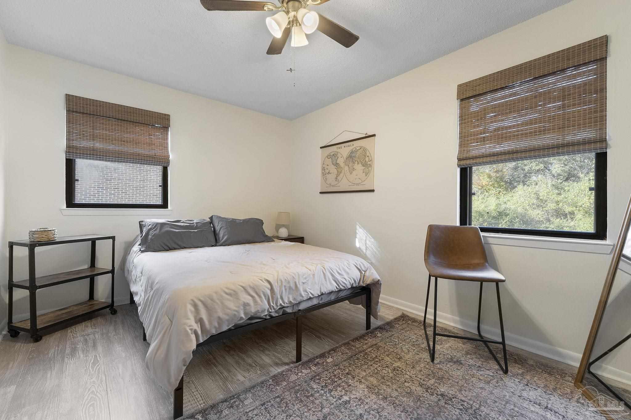 465 Ronda Street Pensacola, FL 32534 - Photo 19 of 48 a bedroom with a bed and a window