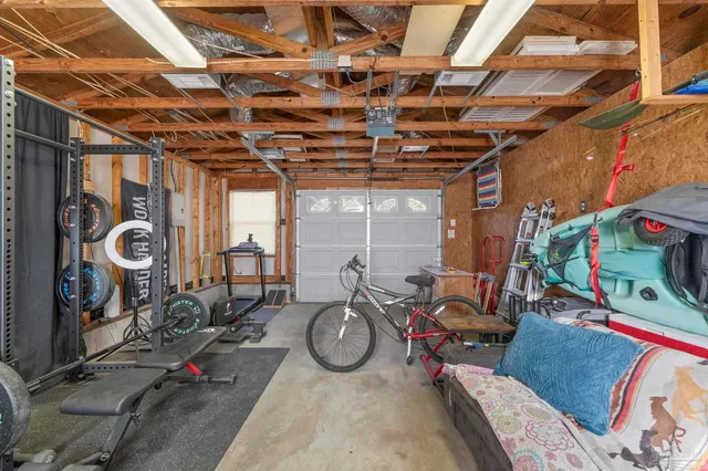 a view of living room with balcony and furniture
