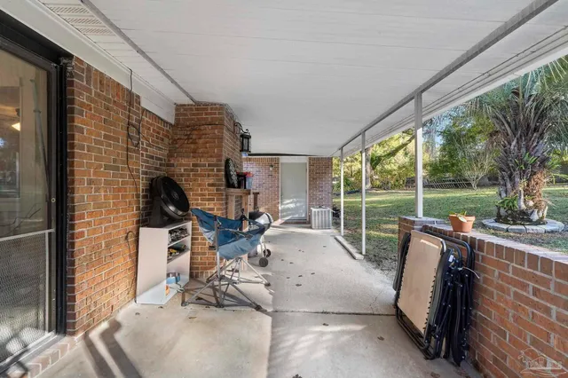 a view of barbeque area with seating space