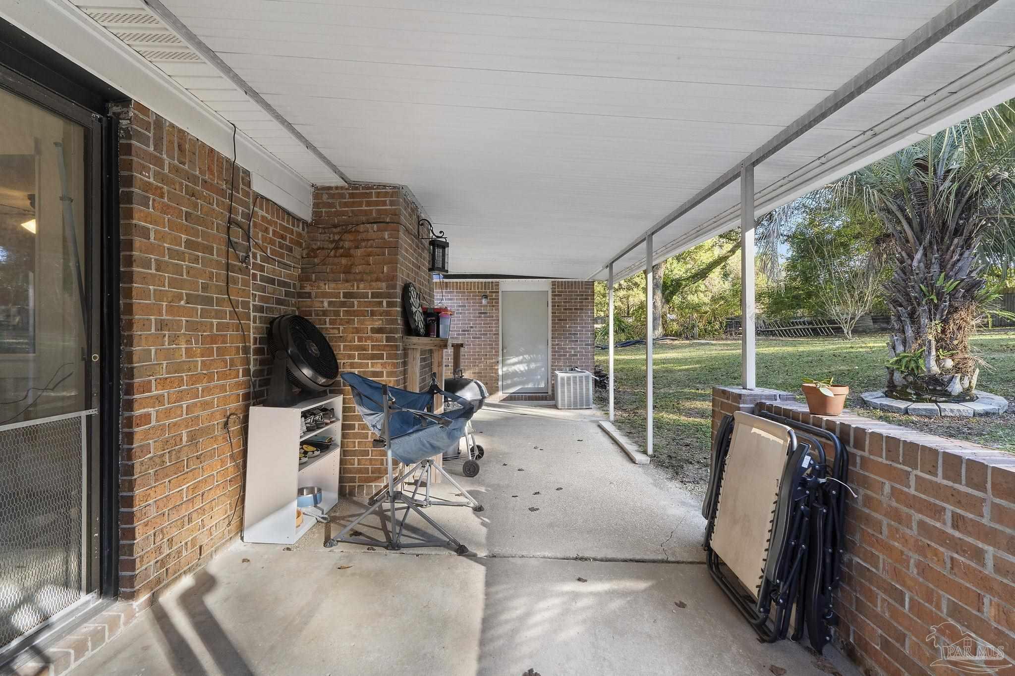 465 Ronda Street Pensacola, FL 32534 - Photo 30 of 48 a view of living room with balcony and furniture