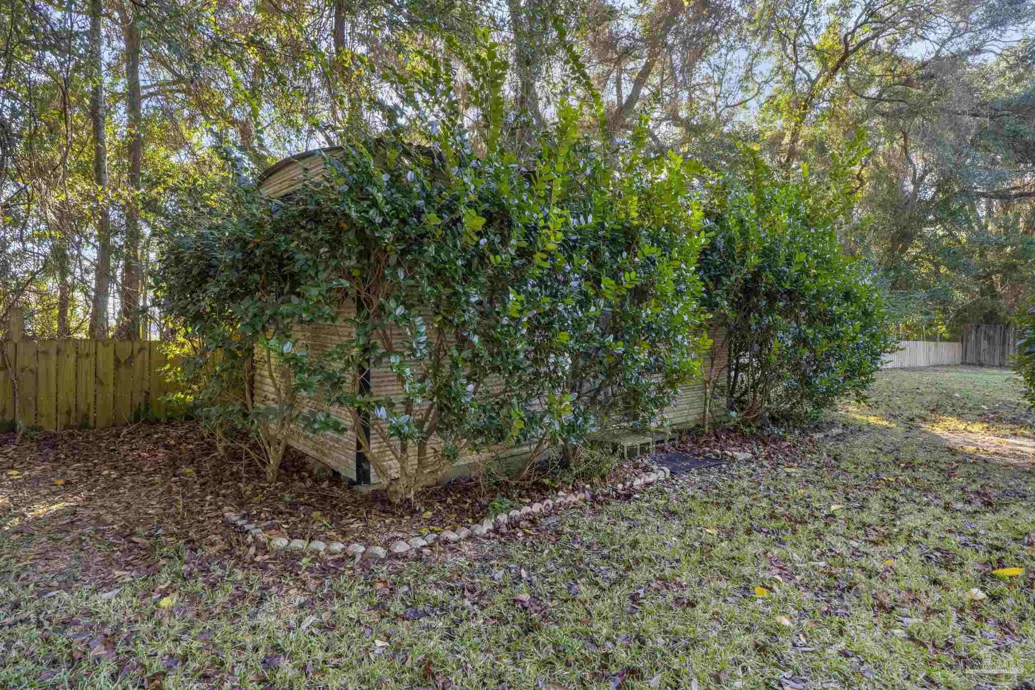 465 Ronda Street Pensacola, FL 32534 - Photo 37 of 48 a view of a yard