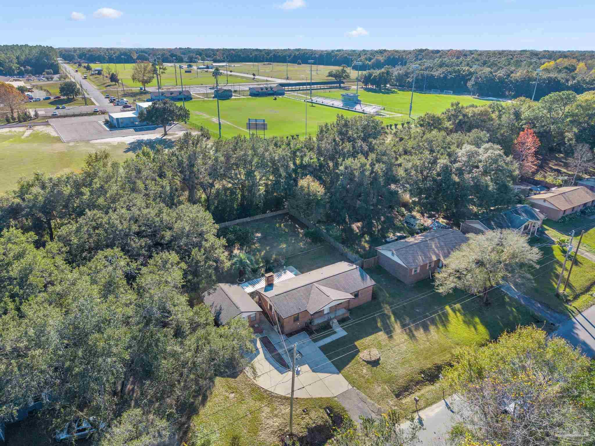 465 Ronda Street Pensacola, FL 32534 - Photo 43 of 48 a view of a lake with a mountain and a yard