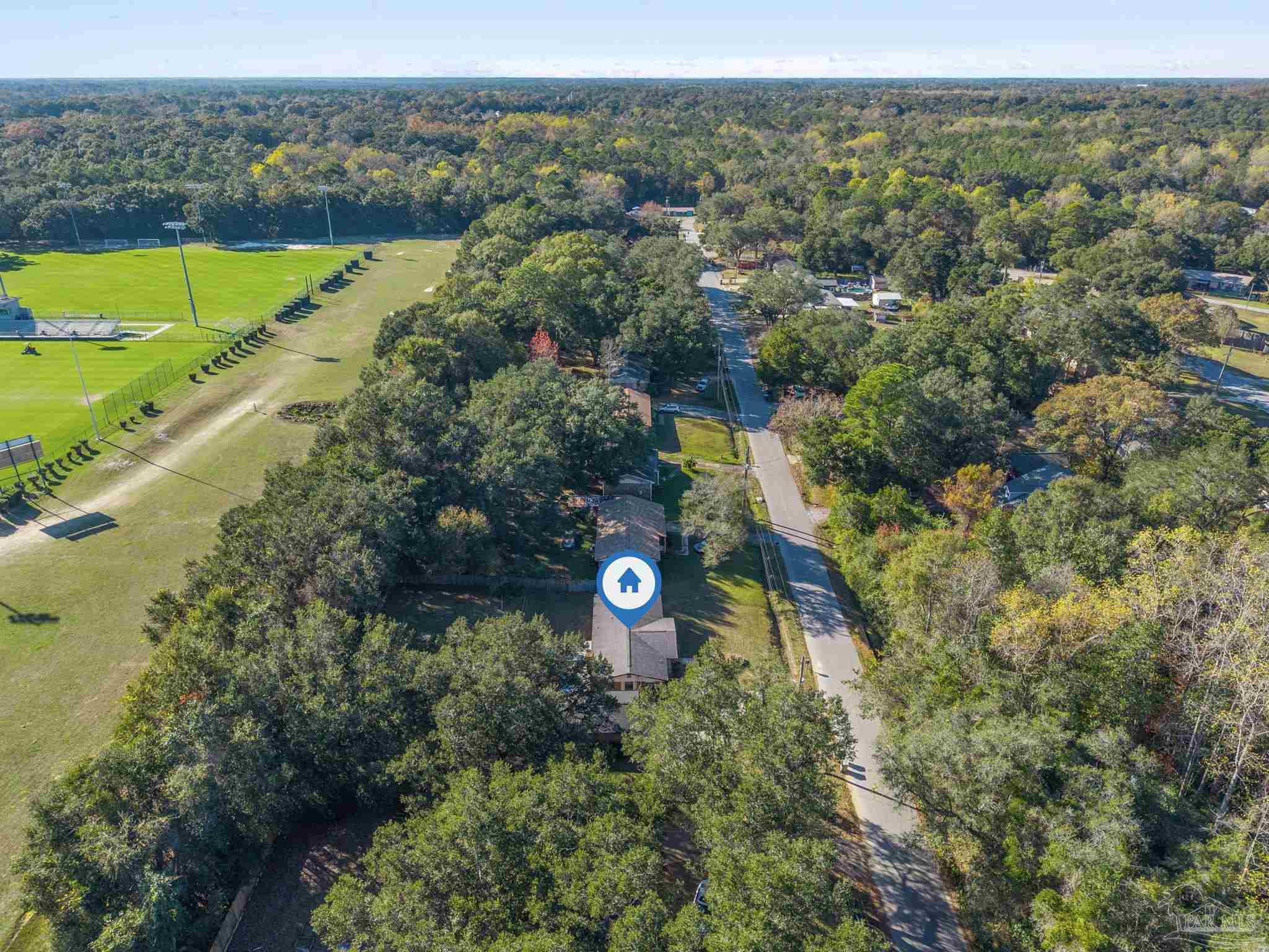 465 Ronda Street Pensacola, FL 32534 - Photo 48 of 48 an aerial view of a house with a yard and lake view