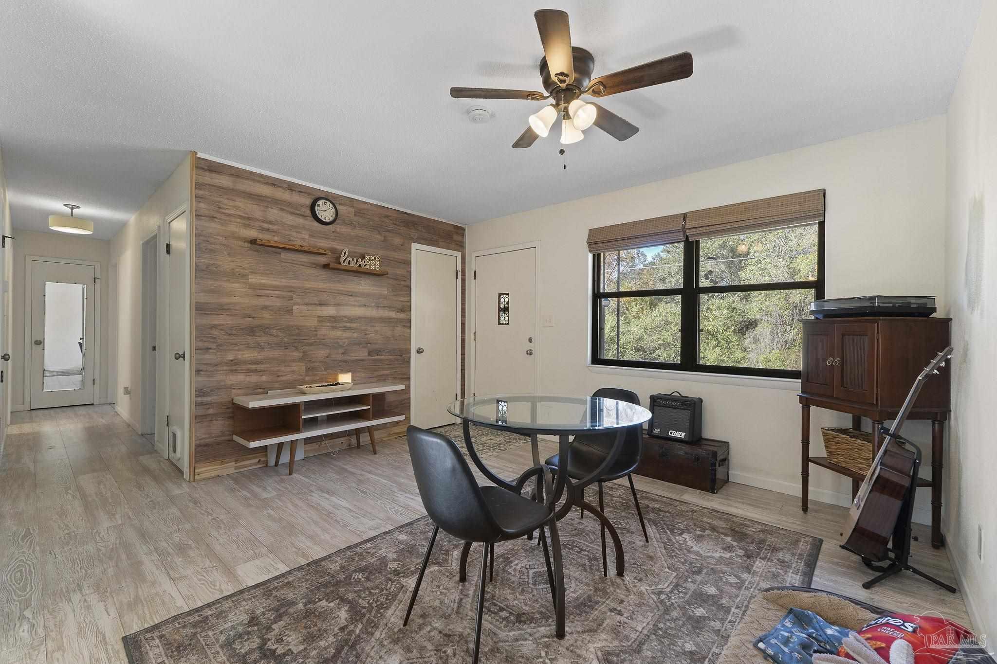 465 Ronda Street Pensacola, FL 32534 - Photo 6 of 48 a view of a workspace with furniture and a window