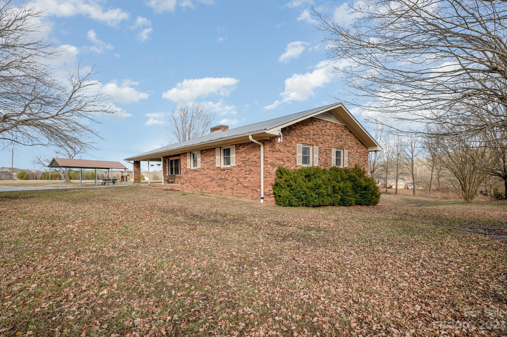 835 Parks Road Woodleaf, NC 27054 - Photo 3 of 28 a view of a house with a yard